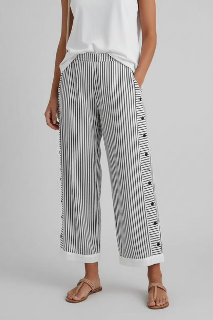 Pantalones de lino a rayas azules con bolsillos laterales