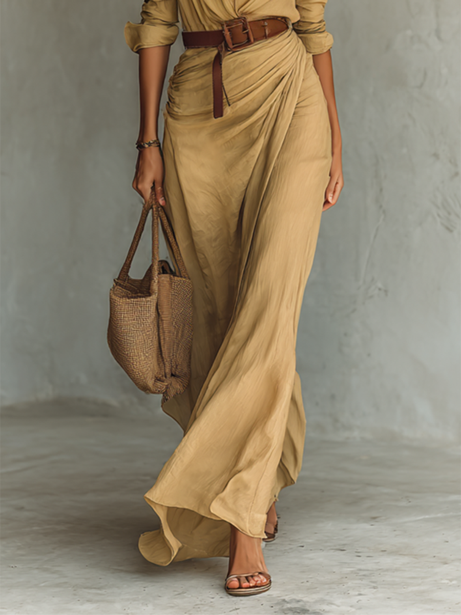 Vestido largo de mujer, de manga larga, con solapa, cinturón y botonadura simple