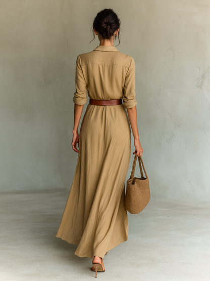 Vestido largo de mujer, de manga larga, con solapa, cinturón y botonadura simple