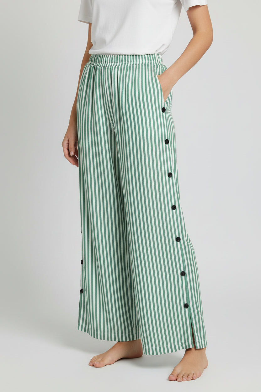 Pantalones de lino a rayas azules con bolsillos laterales