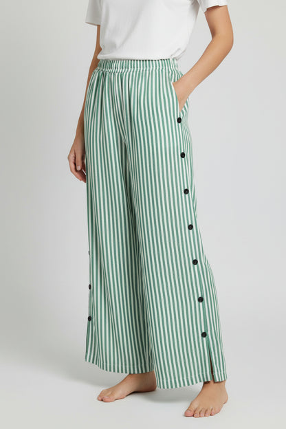 Pantalones de lino a rayas azules con bolsillos laterales