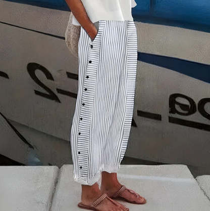 Pantalones de lino a rayas azules con bolsillos laterales